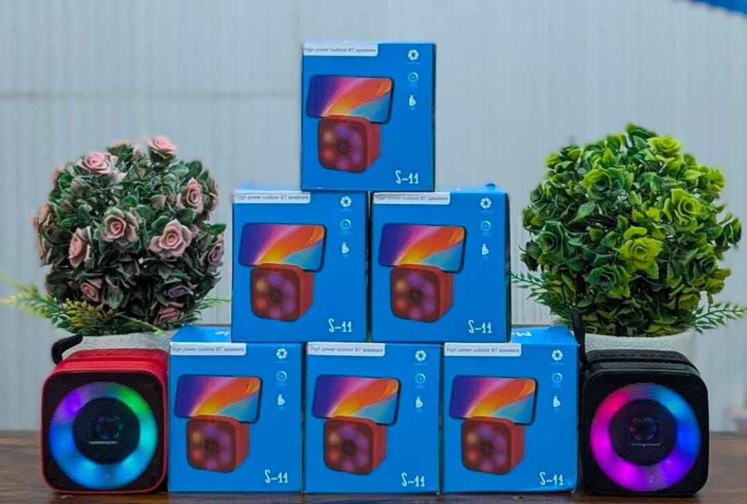 S11 Mini Portable Bluetooth Speaker with Phone Holder, RGB Lights, Super Bass & 10-Hour Playtime – Compact Travel Wireless Speaker (Random Color)